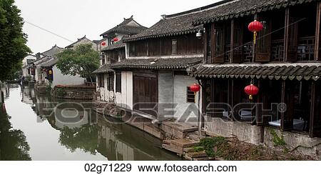 Houses along the canal, Zhouzhuang, Jiangsu Province, China View Large Photo Image Stock Photo - Houses along the canal, Zhouzhuang, Jiangsu Province, China. Fotosearch