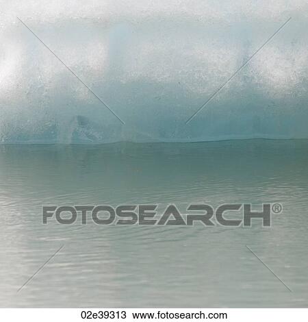 Stock Image - Iceberg in water. Fotosearch