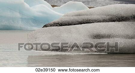 Icebergs floating in the ocean View Large Photo Image Stock Image - Icebergs floating in the ocean. Fotosearch