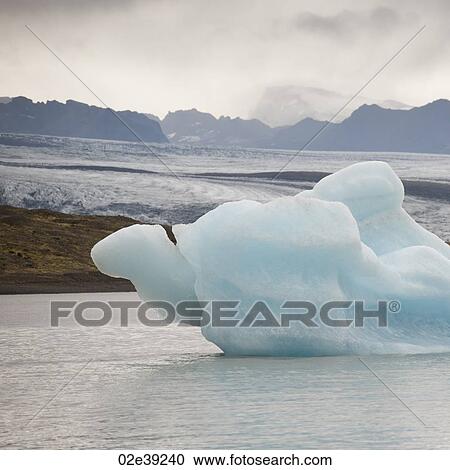 Icebergs floating in the ocean View Large Photo Image Stock Image - Icebergs floating in the ocean. Fotosearch