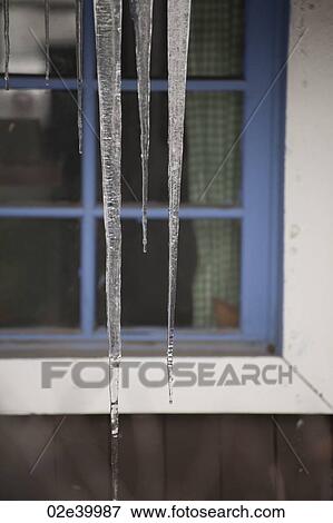 Stock Photo - Icicles hanging in Vail, Colorado. Fotosearch