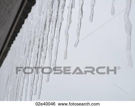 Stock Photograph - Icicles hanging in Vail, Colorado. Fotosearch