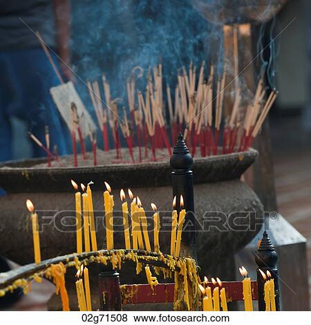 Incense sticks and candles burning at Wat Phrathat Doi Suthep, Chiang Mai, Thailand View Large Photo Image Stock Photo - Incense sticks and candles burning at Wat Phrathat Doi Suthep, Chiang Mai, Thailand. Fotosearch