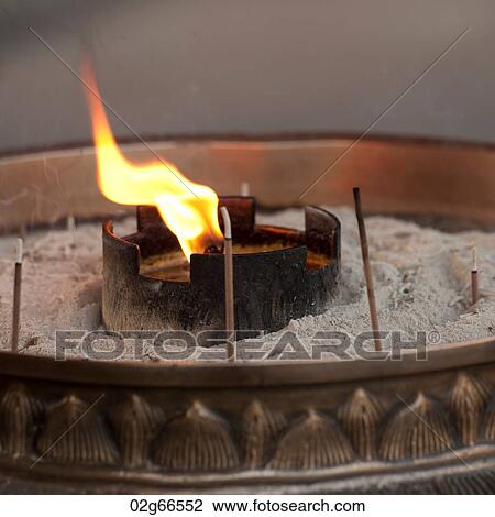 Incense sticks with an oil lamp burning in Todaiji Temple, Nara, Japan View Large Photo Image Stock Image - Incense sticks with an oil lamp burning in Todaiji Temple, Nara, Japan. Fotosearch