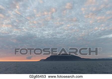 Island in the Pacific Ocean at sunset, Isabela Island, Galapagos Islands, Ecuador View Large Photo Image Stock Image - Island in the Pacific Ocean at sunset, Isabela Island, Galapagos Islands, Ecuador. Fotosearch