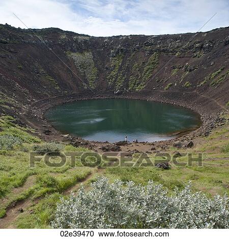 Lake in round volcano crater View Large Photo Image Stock Image - Lake in round volcano crater. Fotosearch
