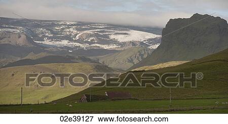 Landscape, glaciers, mountains and farmland, with barns View Large Photo Image Stock Photo - Landscape, glaciers, mountains and farmland, with barns. Fotosearch