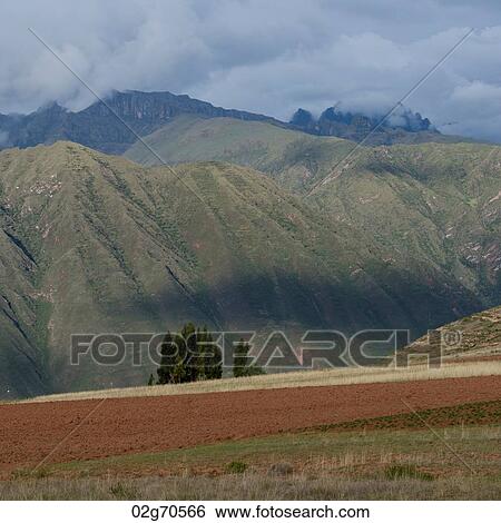 Landscape in front of a mountain range, Sacred Valley, Cusco Region, Peru View Large Photo Image Stock Photograph - Landscape in front of a mountain range, Sacred Valley, Cusco Region, Peru. Fotosearch