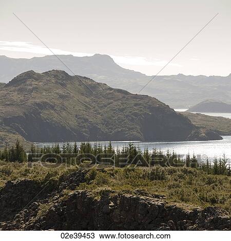 Landscape, mountainside past ocean inlet View Large Photo Image Stock Image - Landscape, mountainside past ocean inlet. Fotosearch