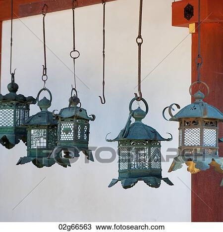 Stock Image - Lanterns hanging at Kasuga Taisha Shrine, Nara, Japan. Fotosearch