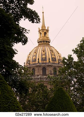 Les Invalides Church behind trees in Paris France View Large Photo Image Stock Photo - Les Invalides Church behind trees in Paris France. Fotosearch