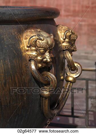 Lion handle on a bronze urn at the Forbidden City, Beijing, China View Large Photo Image Stock Photo - Lion handle on a bronze urn at the Forbidden City, Beijing, China. Fotosearch