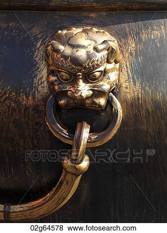 Lion handle on a bronze urn at the Forbidden City, Beijing, China View Large Photo Image Stock Photo - Lion handle on a bronze urn at the Forbidden City, Beijing, China. Fotosearch