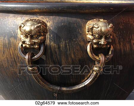 Lion handle on a bronze urn at the Forbidden City, Beijing, China View Large Photo Image Stock Photo - Lion handle on a bronze urn at the Forbidden City, Beijing, China. Fotosearch