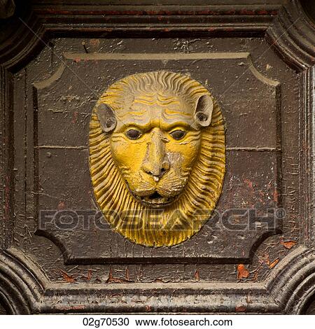 Lion's face carved on a door, Cuzco, Peru View Large Photo Image Stock Image - Lion's face carved on a door, Cuzco, Peru. Fotosearch