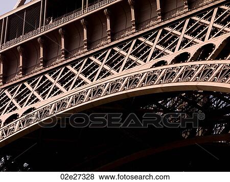 Stock Photo - Looking upward at the Eiffel Tower. Fotosearch