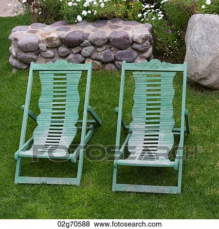 Lounge chairs in a garden of Willka Tika Guesthouse, Willka Tika, Sacred Valley, Cusco Region, Peru View Large Photo Image Stock Photo - Lounge chairs in a garden of Willka Tika Guesthouse, Willka Tika, Sacred Valley, Cusco Region, Peru. Fotosearch