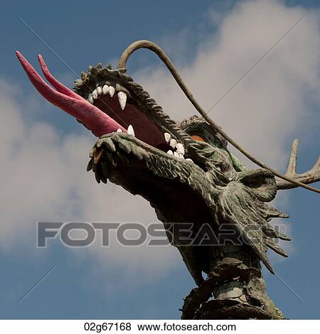 Low angle view of a dragon's statue in Yongdusan Park, Jung-gu, Busan, Yeongnam, South Korea View Large Photo Image Stock Photo - Low angle view of a dragon's statue in Yongdusan Park, Jung-gu, Busan, Yeongnam, South Korea. Fotosearch