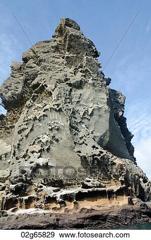 Stock Photo - Low angle view of a pinnacle rock, Bartolome Island, Galapagos Islands, Ecuador. Fotosearch