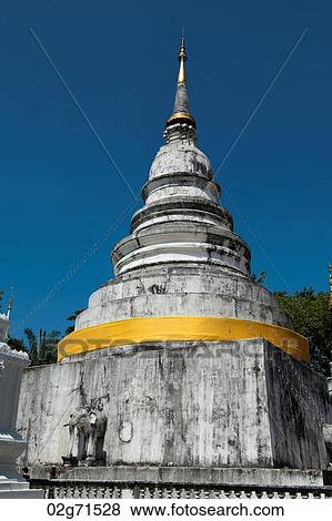 Low angle view of a stupa at Wat Phra Singh, Chiang Mai, Thailand View Large Photo Image Stock Photo - Low angle view of a stupa at Wat Phra Singh, Chiang Mai, Thailand. Fotosearch