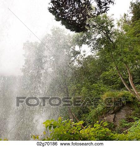 Low angle view of a waterfall, Steinsdalsfossen, Norheimsund, Hardangervidda, Hardanger, Norway View Large Photo Image Stock Photograph - Low angle view of a waterfall, Steinsdalsfossen, Norheimsund, Hardangervidda, Hardanger, Norway. Fotosearch