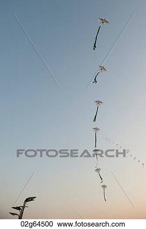 Low angle view of kites in the sky, Olympic Green, Beijing, China View Large Photo Image Stock Image - Low angle view of kites in the sky, Olympic Green, Beijing, China. Fotosearch