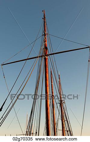 Low angle view of masts of a sailboat, Oslo Harbor, Oslo, Norway View Large Photo Image Stock Photography - Low angle view of masts of a sailboat, Oslo Harbor, Oslo, Norway. Fotosearch