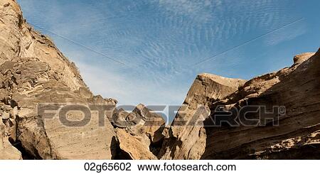 Low angle view of rock formations, Tagus Cove, Isabela Island, Galapagos Islands, Ecuador View Large Photo Image Stock Image - Low angle view of rock formations, Tagus Cove, Isabela Island, Galapagos Islands, Ecuador. Fotosearch