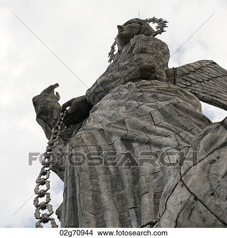 Low angle view of the statue of winged Virgin Mary of Quito, El Panecillo Hill, Quito, Ecuador View Large Photo Image Picture - Low angle view of the statue of winged Virgin Mary of Quito, El Panecillo Hill, Quito, Ecuador. Fotosearch