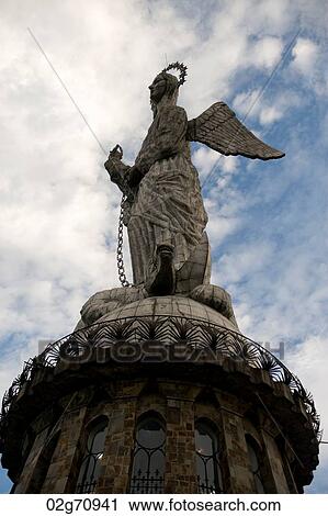 Low angle view of the statue of winged Virgin Mary of Quito, El Panecillo Hill, Quito, Ecuador View Large Photo Image Stock Image - Low angle view of the statue of winged Virgin Mary of Quito, El Panecillo Hill, Quito, Ecuador. Fotosearch