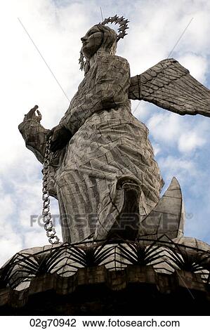 Stock Image - Low angle view of the statue of winged Virgin Mary of Quito, El Panecillo Hill, Quito, Ecuador. Fotosearch