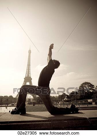 Man doing yoga in Paris France View Large Photo Image Stock Photography - Man doing yoga in Paris France. Fotosearch