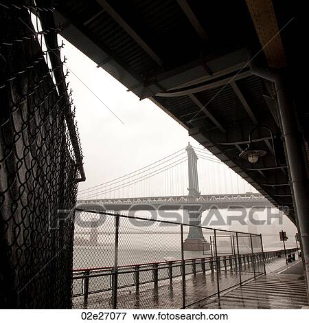 Stock Photo - Manhattan Bridge in Manhattan, New York City, U. S. A.. Fotosearch