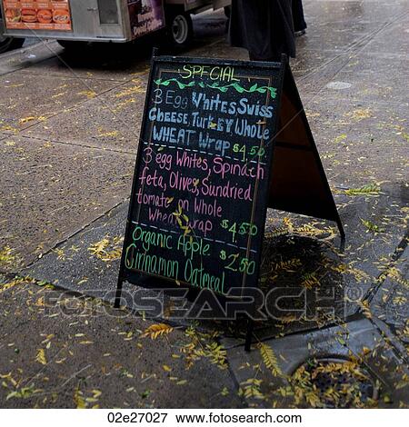 Menu sandwich board on sidewalk in Manhattan, New York City, U. S. A. View Large Photo Image Stock Photo - Menu sandwich board on sidewalk in Manhattan, New York City, U. S. A.. Fotosearch