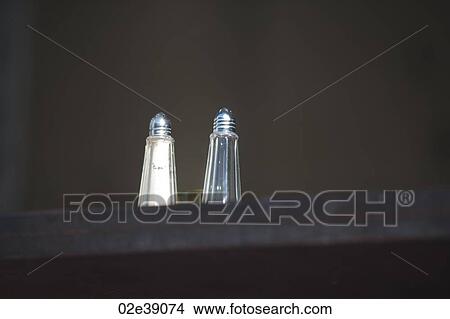 Metal and glass salt and pepper shakers View Large Photo Image Picture - Metal and glass salt and pepper shakers. Fotosearch