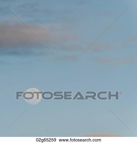 Moon in the sky, Santiago Island, Galapagos Islands, Ecuador View Large Photo Image Stock Photo - Moon in the sky, Santiago Island, Galapagos Islands, Ecuador. Fotosearch
