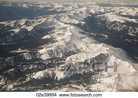 Mountain peak covered in snow in Vail, Colorado View Large Photo Image Picture - Mountain peak covered in snow in Vail, Colorado. Fotosearch