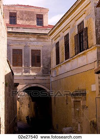 Narrow street in Rhodes Greece View Large Photo Image Stock Image - Narrow street in Rhodes Greece. Fotosearch