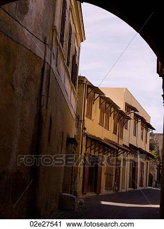 Narrow street in Rhodes Greece View Large Photo Image Stock Image - Narrow street in Rhodes Greece. Fotosearch