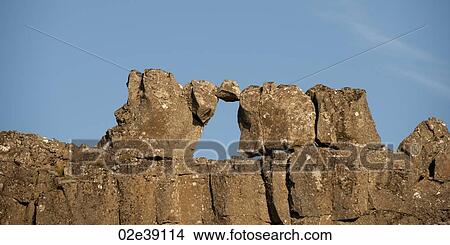 Natural rock formation of a window against the sky View Large Photo Image Picture - Natural rock formation of a window against the sky. Fotosearch