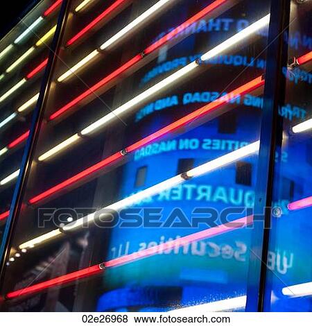 Stock Photo - Neon lights in Times Square Manhattan, New York City, U. S. A.. Fotosearch