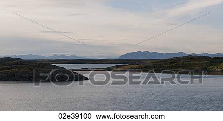 Ocean and fjords looking towards misty mountains View Large Photo Image Stock Image - Ocean and fjords looking towards misty mountains. Fotosearch
