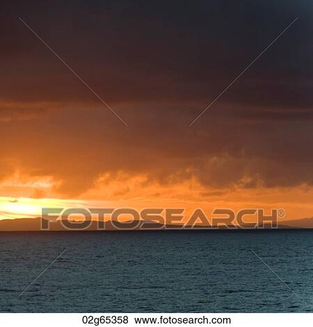 Ocean at sunset, Galapagos Islands, Ecuador View Large Photo Image Stock Photo - Ocean at sunset, Galapagos Islands, Ecuador. Fotosearch
