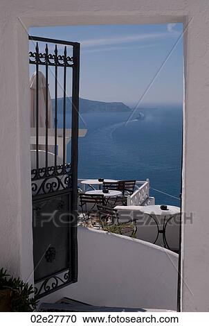 Ocean view through doorway in Santorini Greece View Large Photo Image Stock Image - Ocean view through doorway in Santorini Greece. Fotosearch