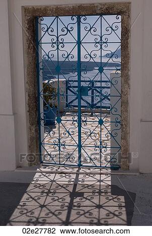 Ocean view through doorway in Santorini Greece View Large Photo Image Stock Image - Ocean view through doorway in Santorini Greece. Fotosearch