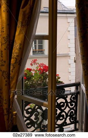 Open draped window in Paris France View Large Photo Image Stock Photo - Open draped window in Paris France. Fotosearch