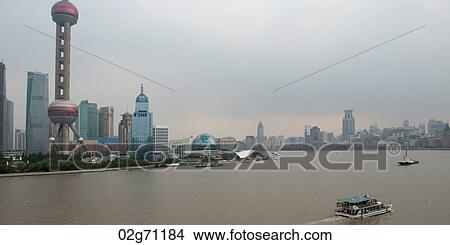 Oriental Pearl Tower and city skyline, Huangpu River, Pudong, Shanghai, China View Large Photo Image Picture - Oriental Pearl Tower and city skyline, Huangpu River, Pudong, Shanghai, China. Fotosearch