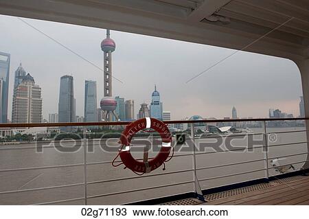 Oriental Pearl Tower and city skyline, Huangpu River, Pudong, Shanghai, China View Large Photo Image Stock Image - Oriental Pearl Tower and city skyline, Huangpu River, Pudong, Shanghai, China. Fotosearch
