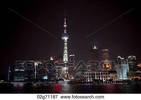 Stock Photo - Oriental Pearl Tower and city skyline, Huangpu River, Pudong, Shanghai, China. Fotosearch