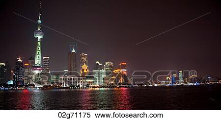 Oriental Pearl Tower and city skyline, Huangpu River, Pudong, Shanghai, China View Large Photo Image Stock Photography - Oriental Pearl Tower and city skyline, Huangpu River, Pudong, Shanghai, China. Fotosearch